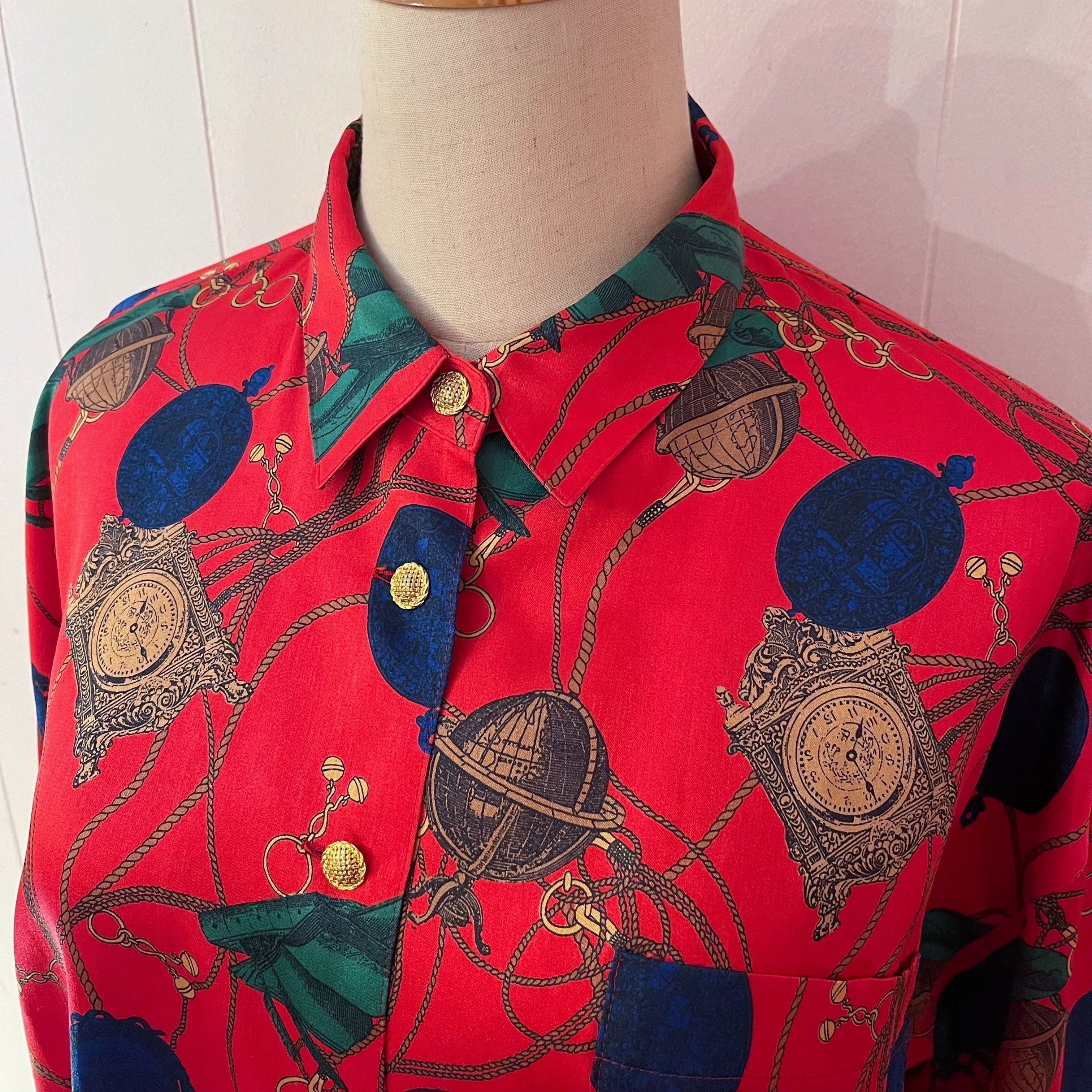 clock and globe red satin blouse
