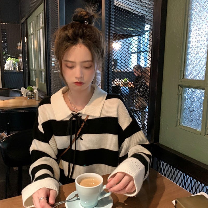 【新作】【送料無料】 韓国版の新しいデザイン感覚のプルアウトポロカラーニッチルーズレイジーカレッジスタイルストライプセータートレンド 0327617817720