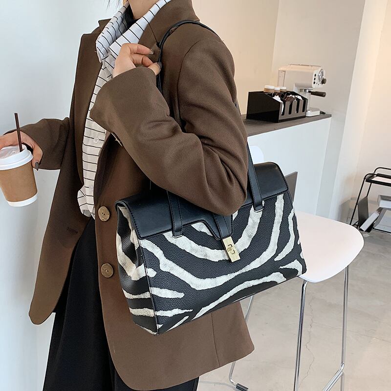 オールマッチバッグ女性の感覚2020新しい流行のファッションネットレッドテクスチャショルダーメッセンジャーバッグハンドバッグプラチナバッグ Tiancai_Wing_Bag28866191555