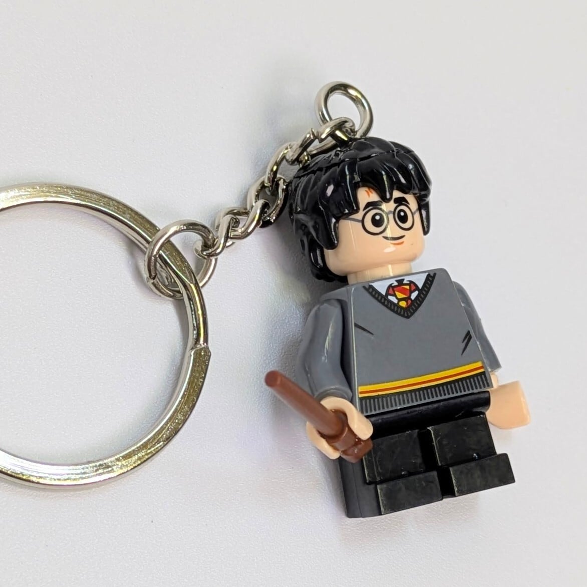 【ブロックフィギュアキーホルダー】Harry Potter / ハリー ポッター /  不死鳥の羽根・ヒイラギの杖 頭部ダメージver. / Hogwarts ( ホグワーツ ) / グリフィンドール 〚アメリカン雑貨 アメトイ〛