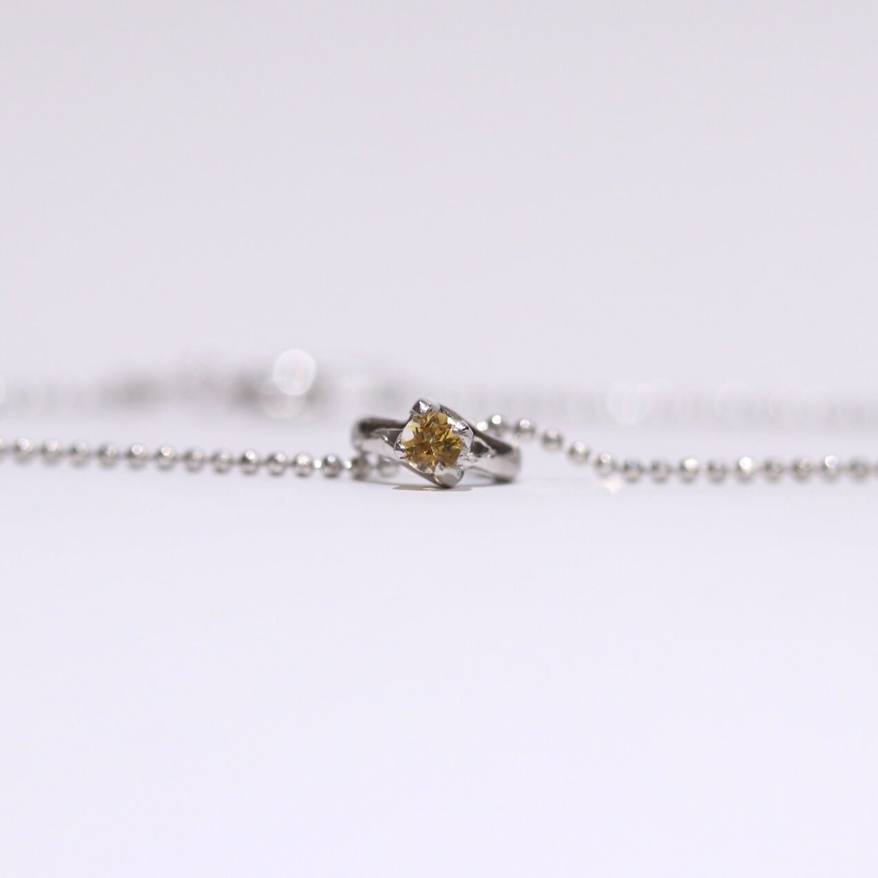 ベビーリングネックレス 11月誕生石 シトリン | Somm Jewelry ベビーリングネックレス 11月誕生石 シトリン | Somm Jewelry