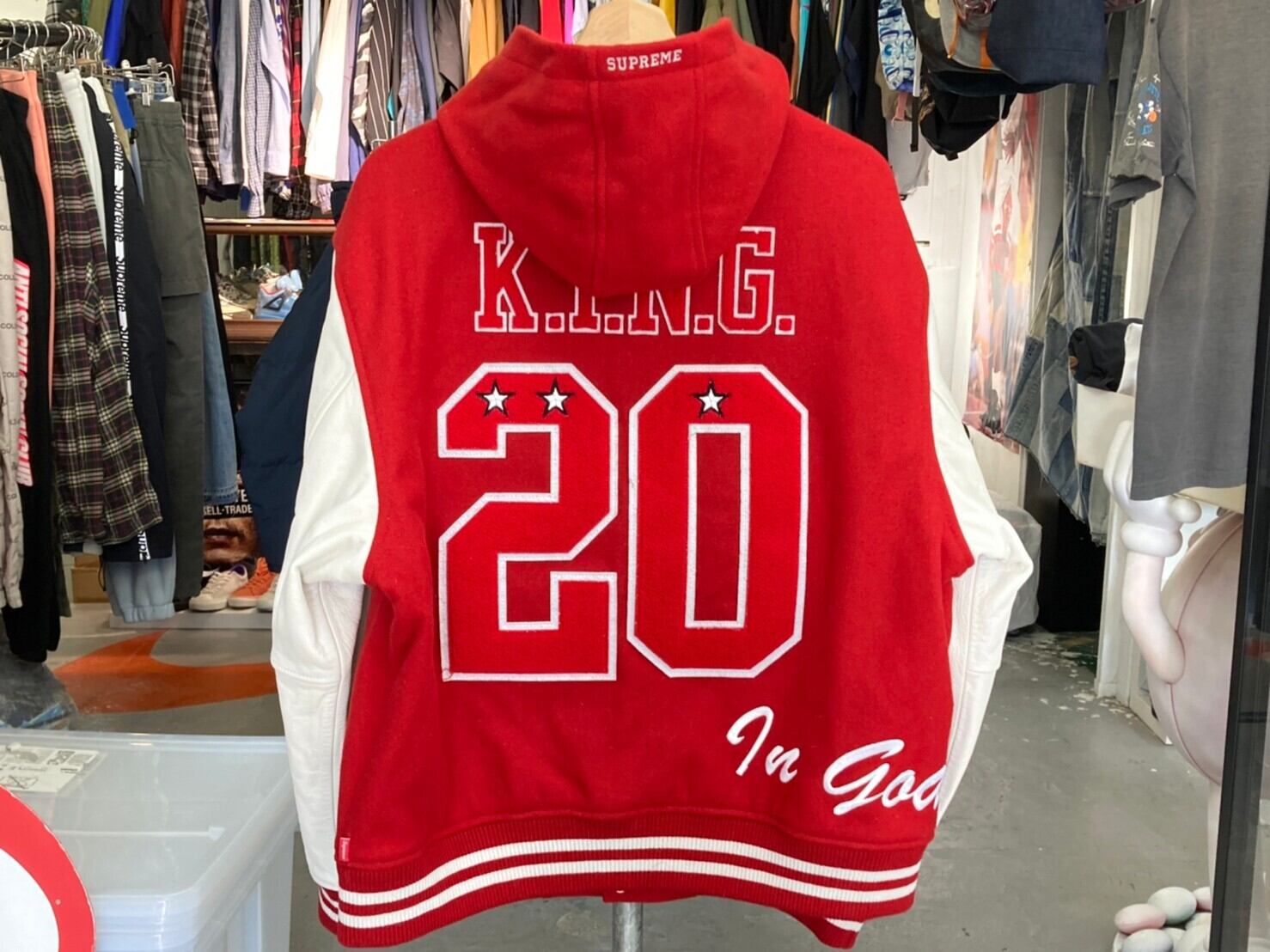supreme king hooded varsity jacket
