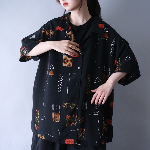 geometry art graphic pattern XXX over silhouette open collar h/s shirt