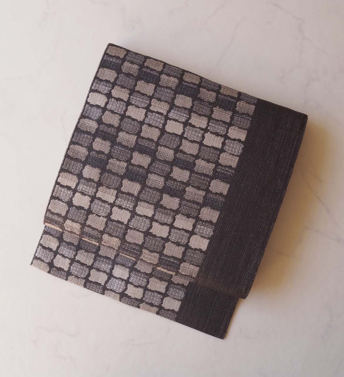 【なごや帯】 檳榔子染地 変わり格子文 紬八寸なごや帯