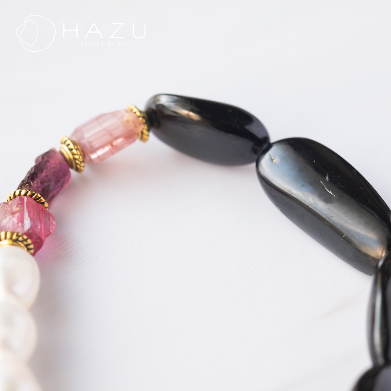 広い心で新しい出会いと挑戦へ［ブラックスピネル／淡水パール／ピンクトルマリン］