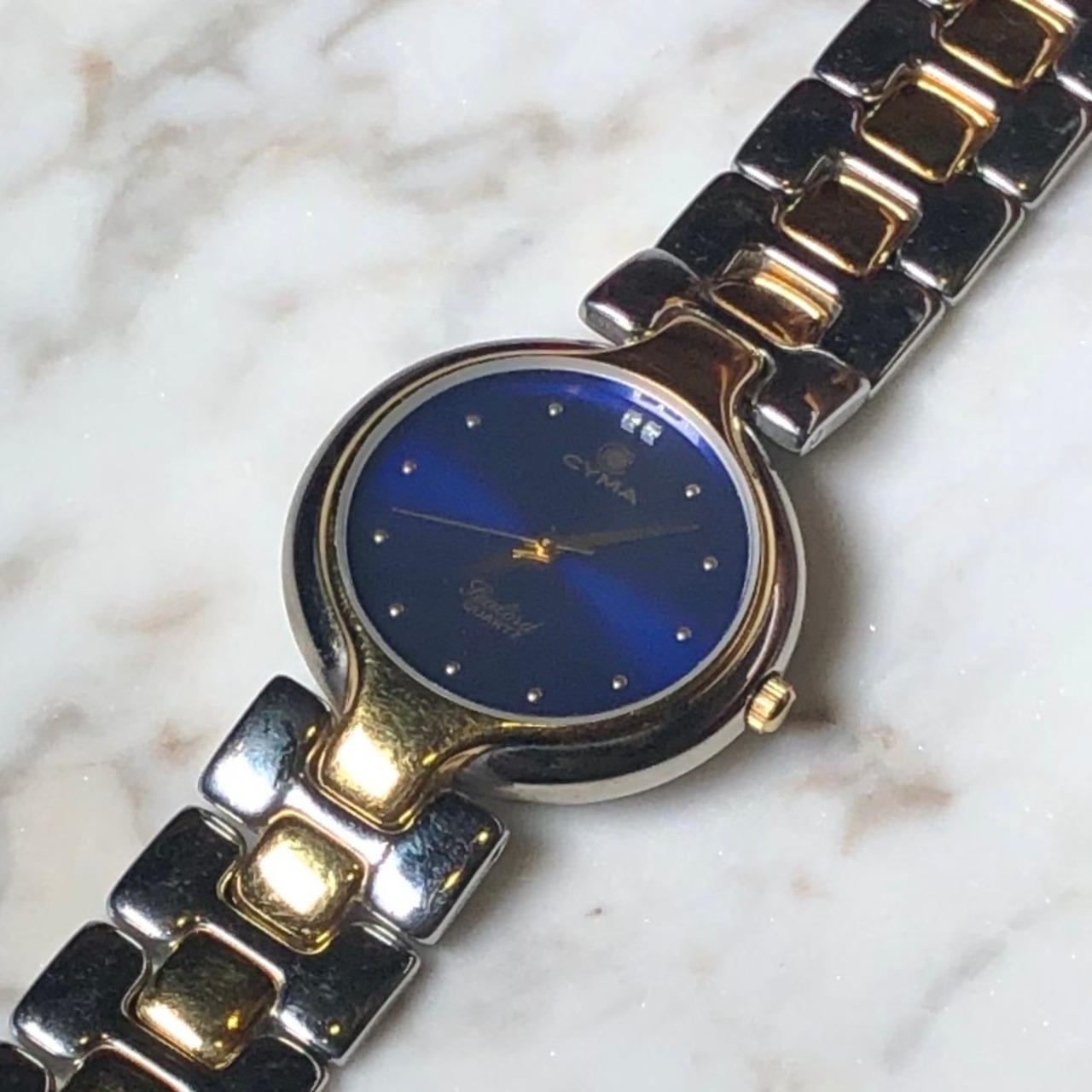 CYMA blue dial quartz watch | NOIR ONLINE
