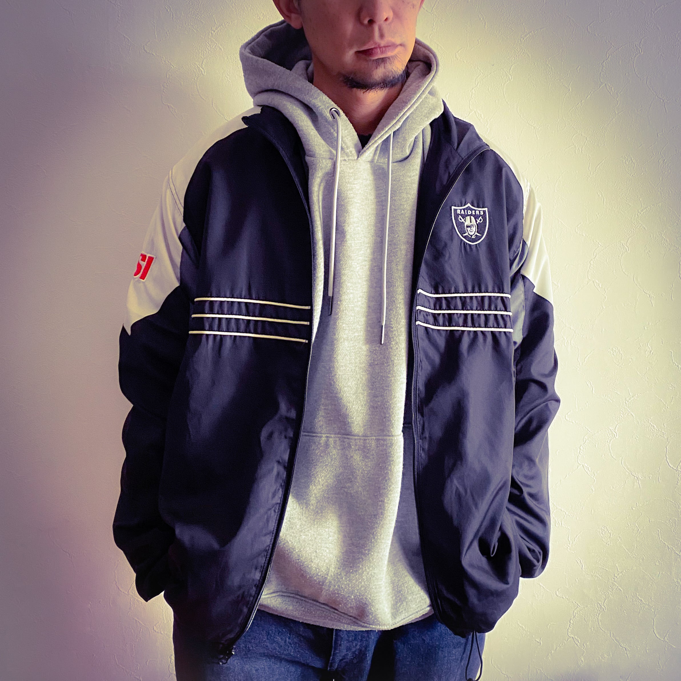 NFL RAIDERS TEAM APPAREL REEBOK WIND JACKET {NFLレイダース チームアパレル リーボック ウインド  ジャケット 古着 used メンズ} 古着 ストリート MGarage used clothing オンラインショップ