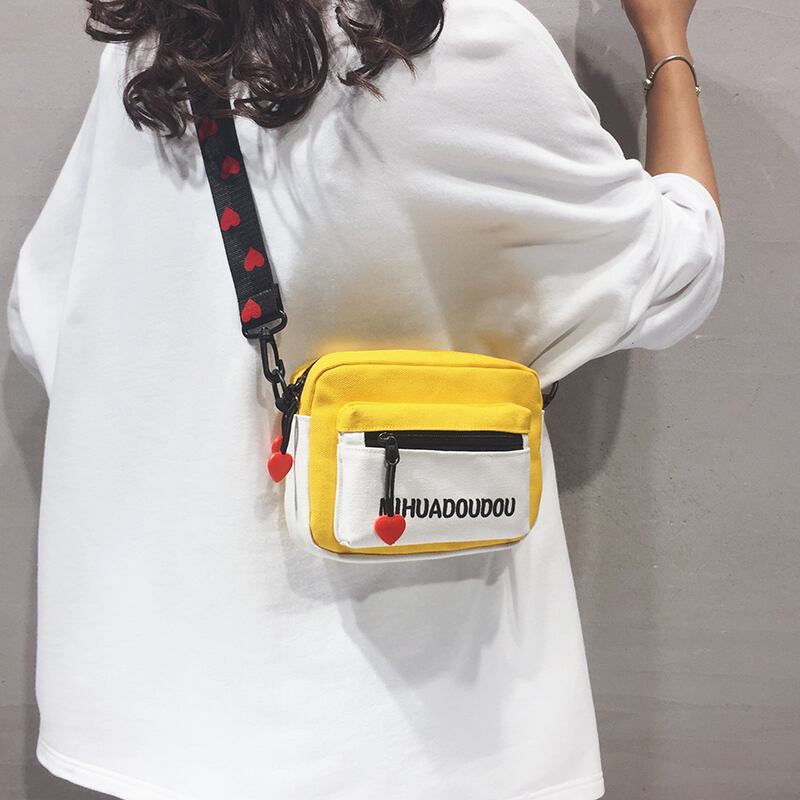 小さなバッグ女性バッグ2020夏の新しい波インワイルドキャンバスショルダーメッセンジャーバッグウエスタンファッション小さな正方形のバッグ Tiancai_Wing_Bag8739368