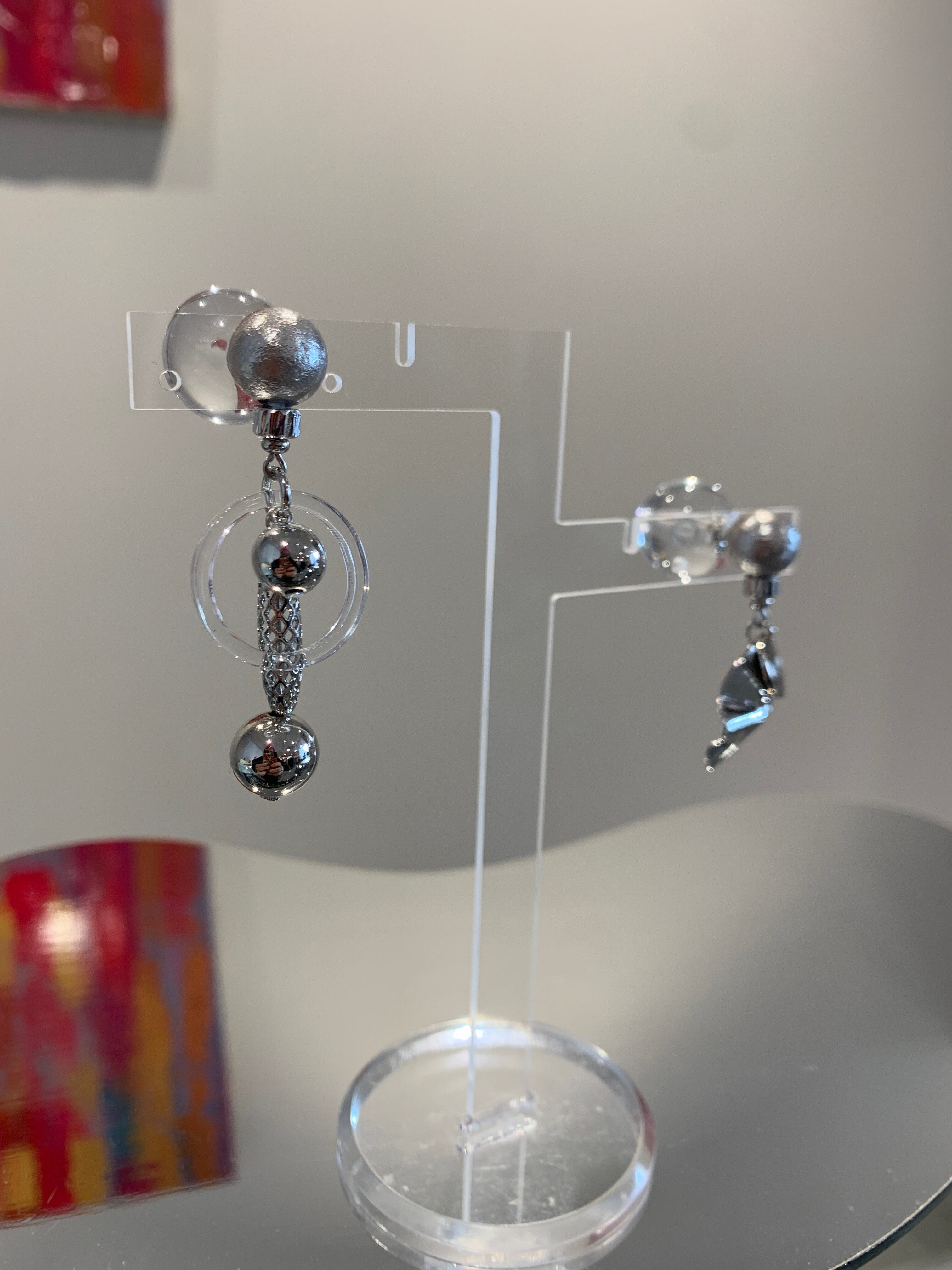 silver clear circle asymmetry