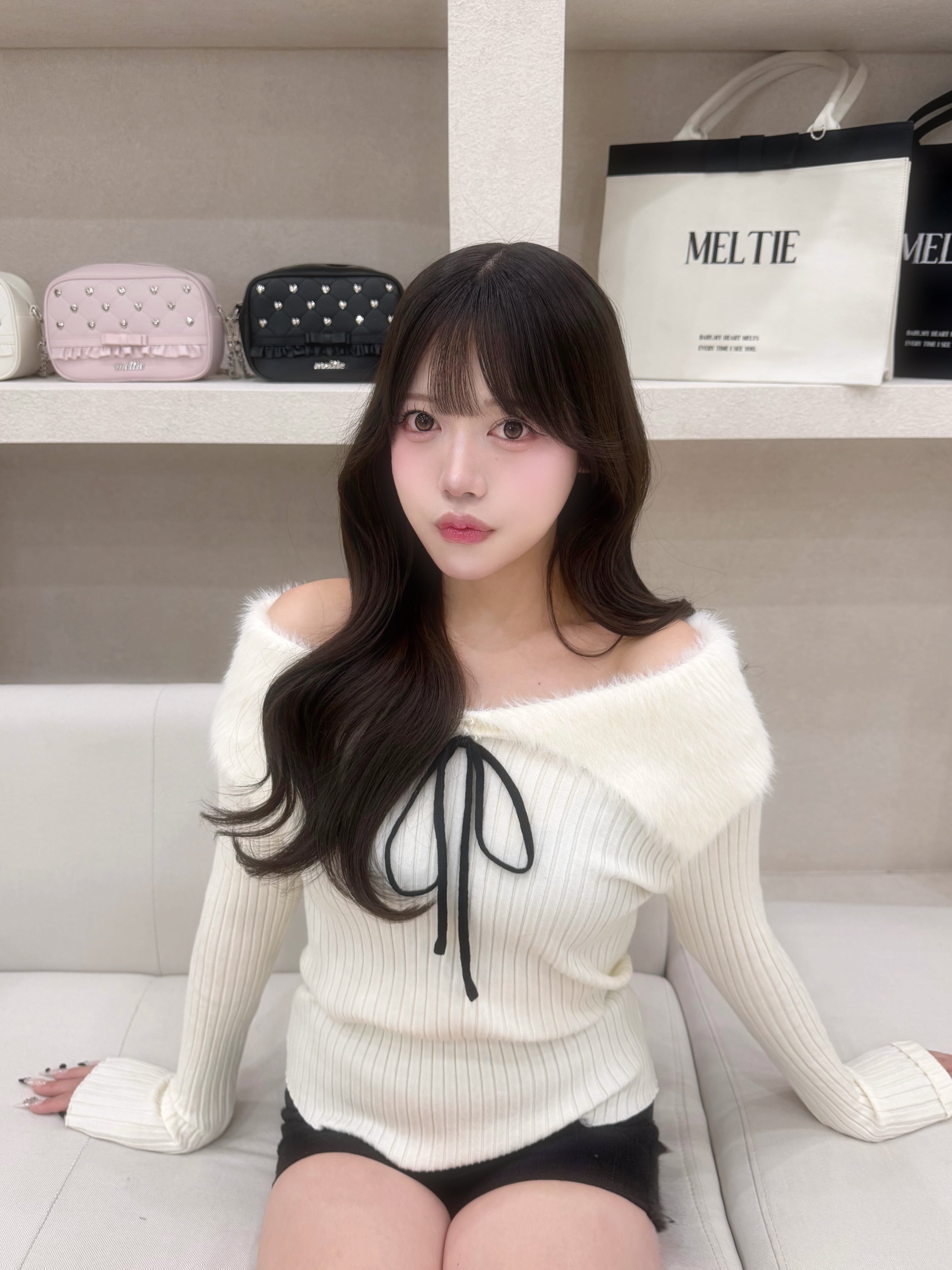 fluffy ribbon offshoulder knit