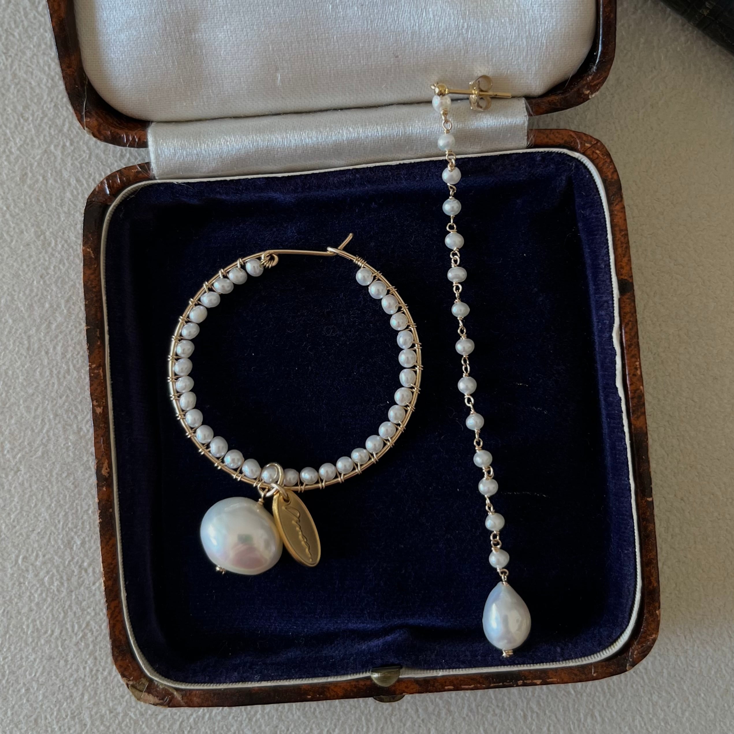 パールのアシンメトリーピアス(イヤリング)