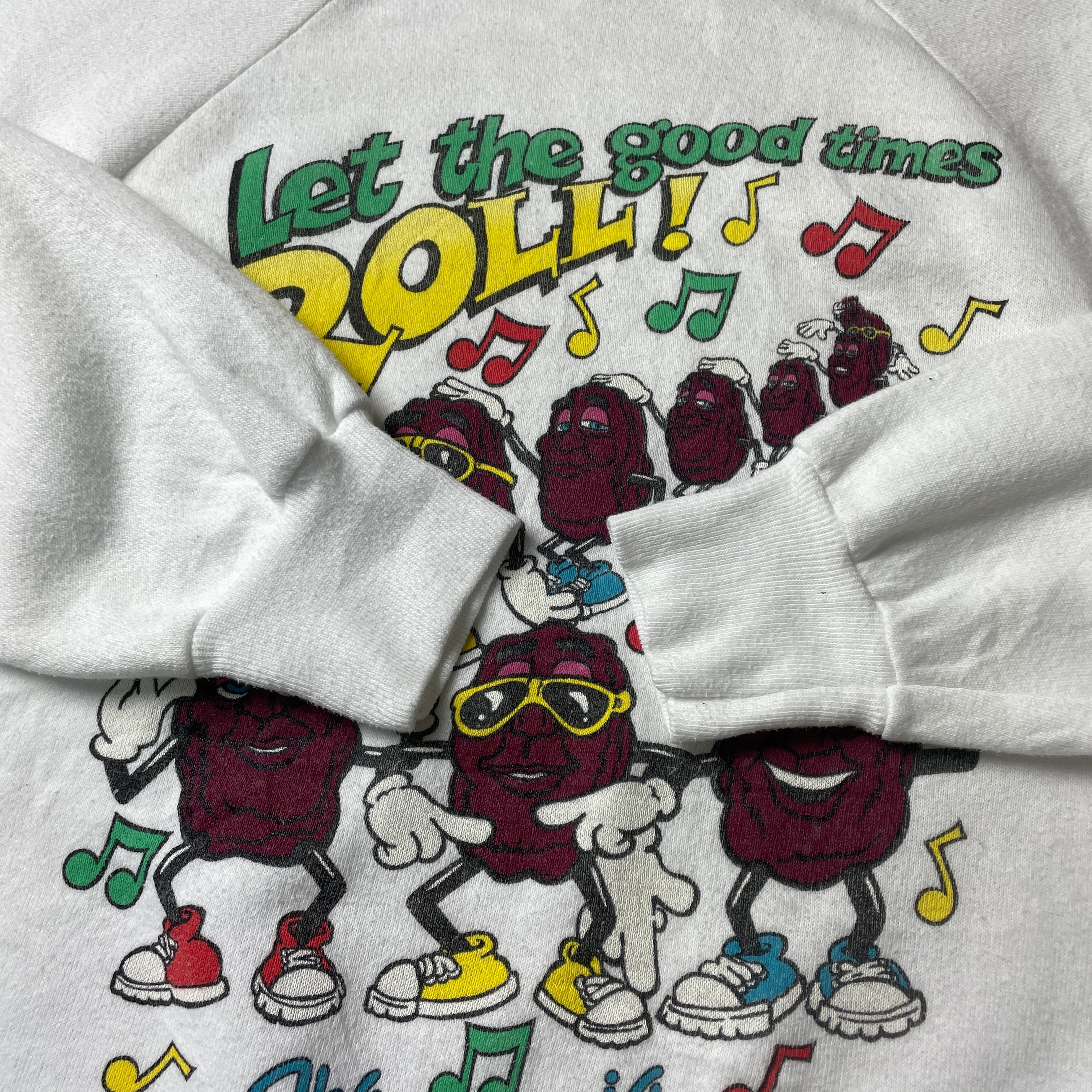 80年代 The California Raisins カリフォルニアレーズン プリントスウェットシャツ メンズM相当 古着 80s ヴィンテージ  トレーナー ラグランスリーブ ホワイト 白【スウェット】【SS2401-30】 | cave 古着屋【公式】古着通販サイト