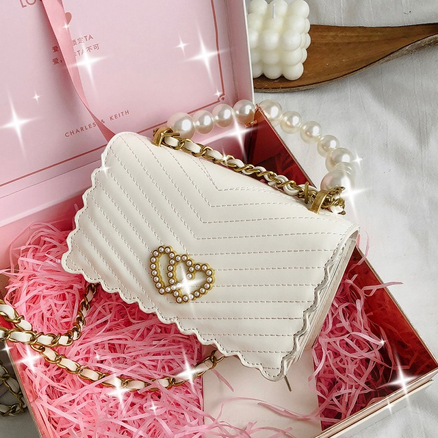ネットセレブレディーススモールバッグ2020新しいトレンディなファッションオールマッチチェーンワンショルダーメッセンジャーバッグパールポータブルスモールスクエアバッグ Tiancai_Wing_Bag5138472