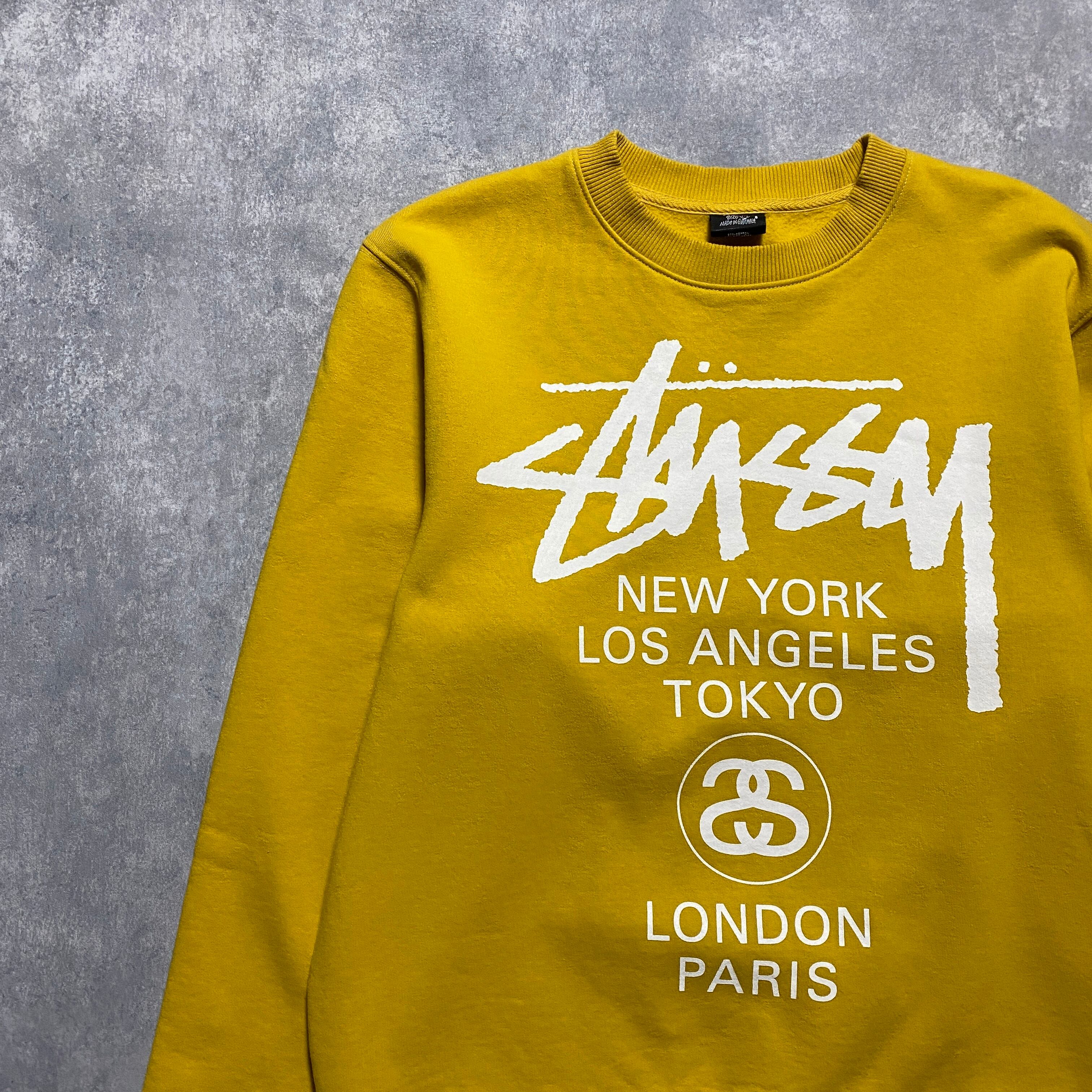 stussy ステューシー ワールドツアー 両面プリント マスタードイエロー