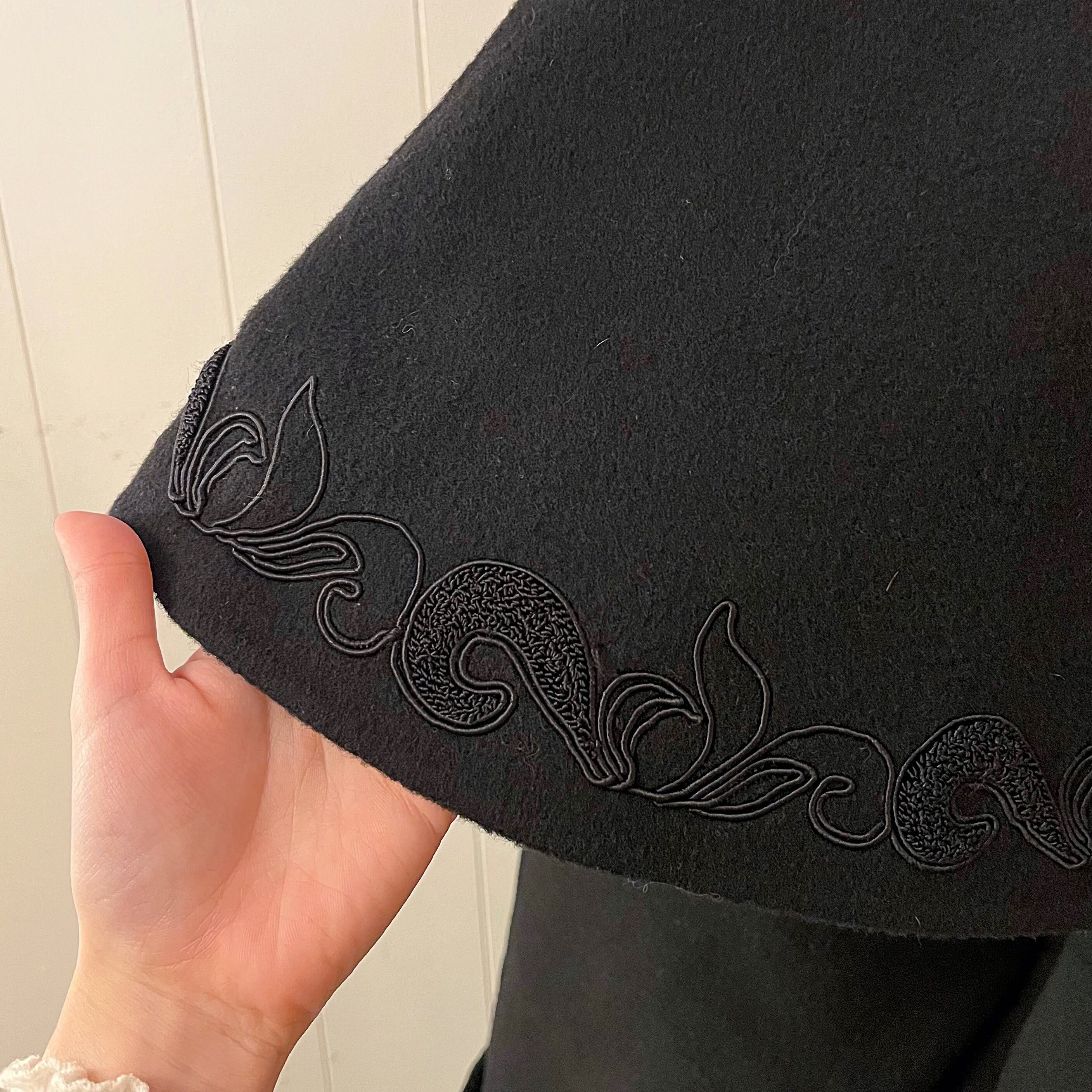 black cape chester coat