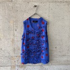 Frilled dot sleeveless top