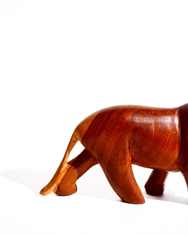 Hand-carved wooden lion object Made in Kenya