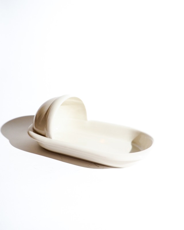 Ceramic container for a pit toilet