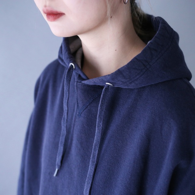 "Champion" dark navy color over silhouette sweat parka