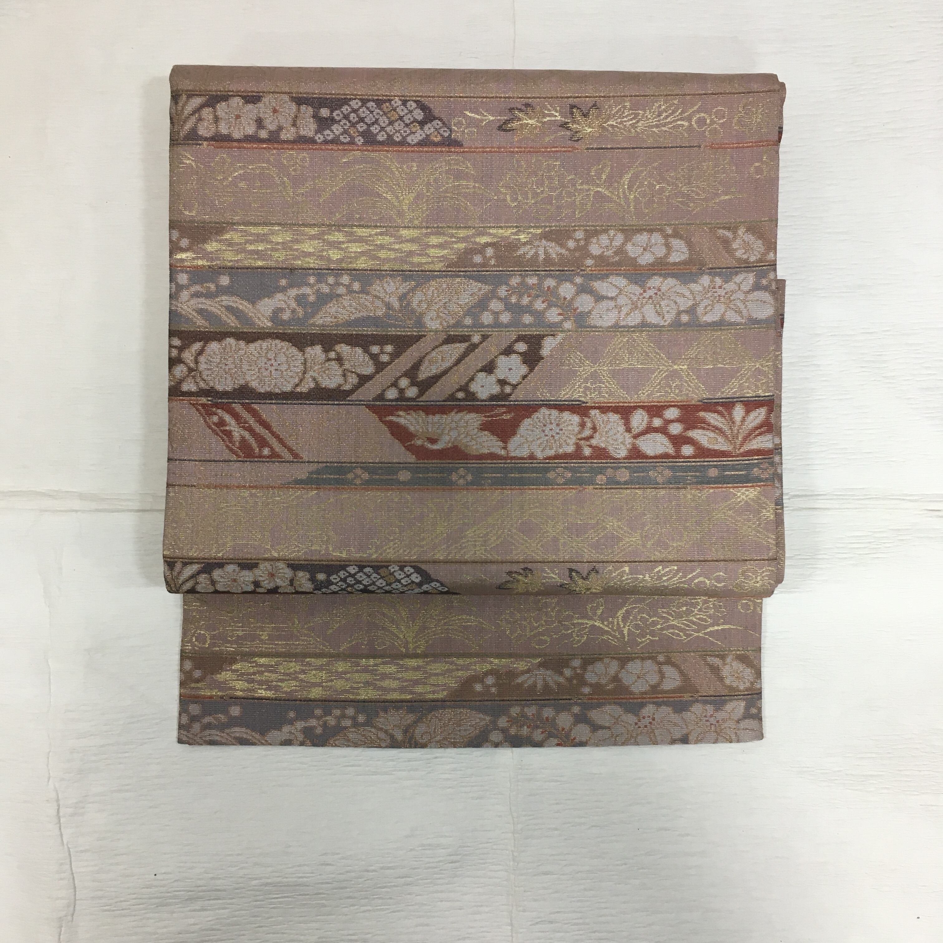 袋帯（肌色地横段に鳥、辻ヶ花模様）