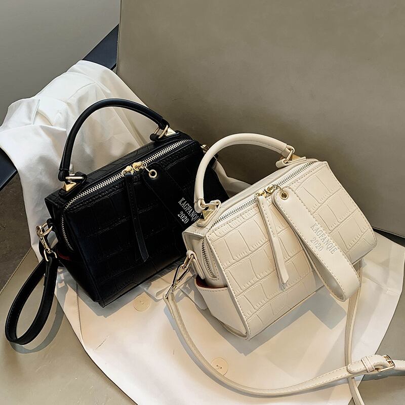 大容量バッグ女性2020新しいトレンドラインファッションネットレッドボストンバッグワイルドショルダーメッセンジャーピローバッグ Tiancai_Wing_Bag5572912