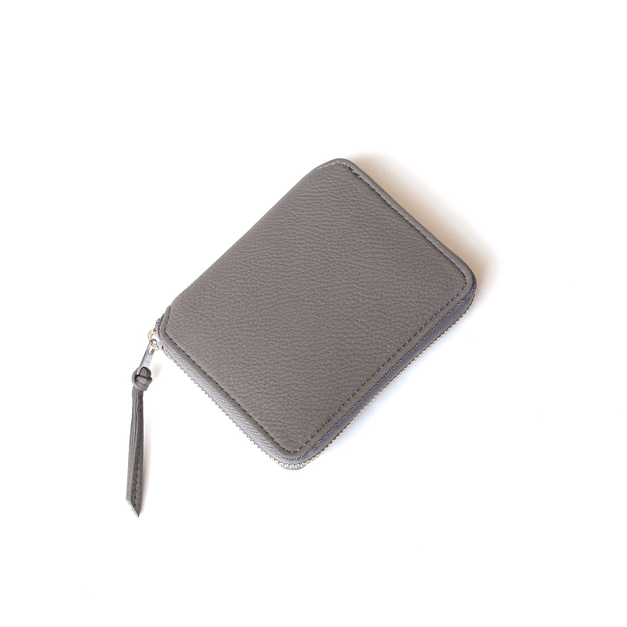 E R A. BUBBLE CALF ROUND PALM WALLET  L002