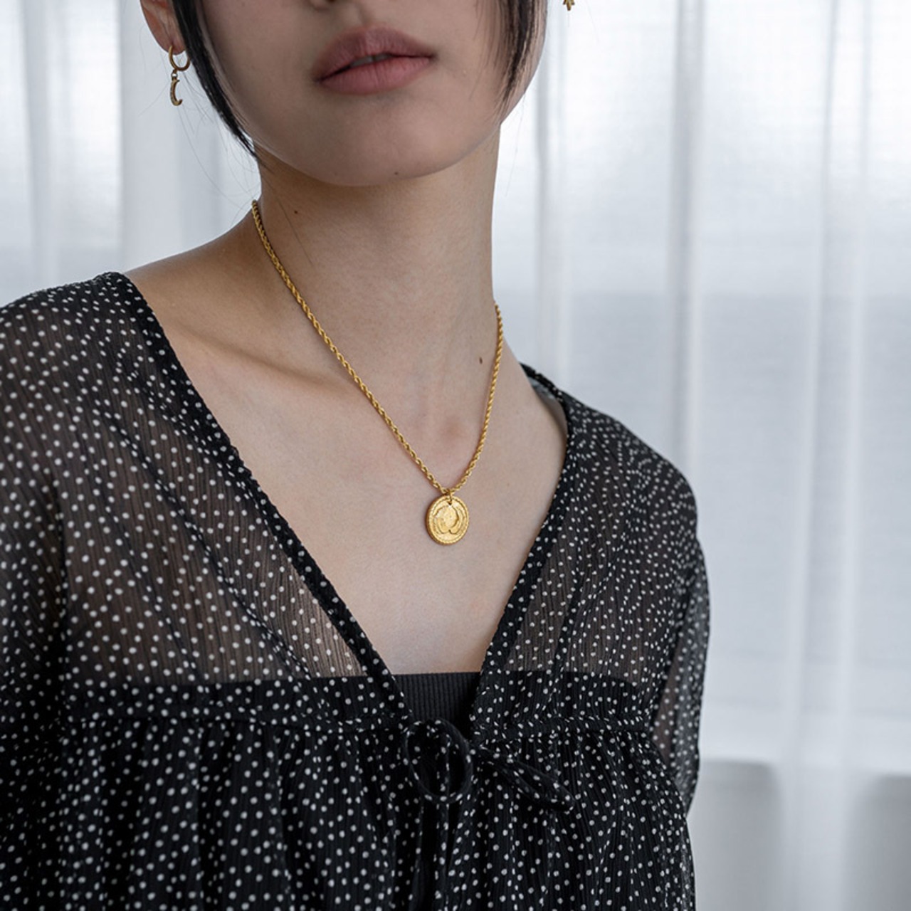 【ネコポス便】金属アレルギー対応のロープチェーンウイングコインネックレス コインネックレス 彫刻 翼 ウィング モチーフ2617