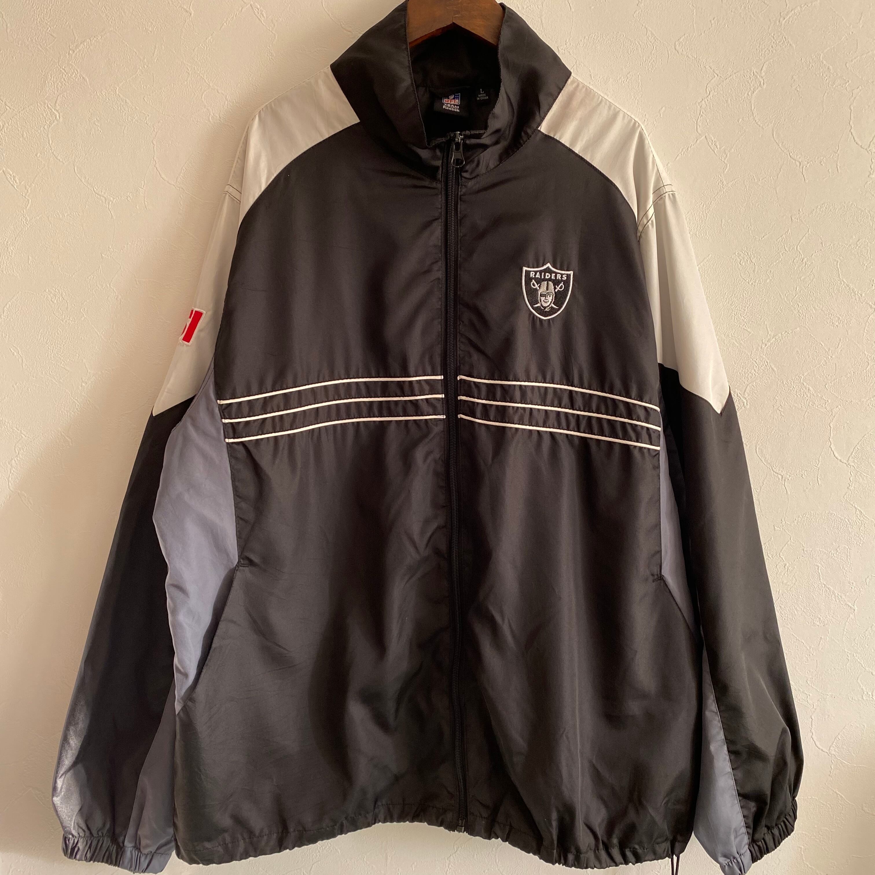 Reebokリーボック × RAIDERSレイダースNFLナイロンジャケット NBA/NFL/NHL/MLB ナイロンジャケット 「ヴィンテージ古着」Y2K Reebok