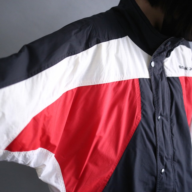 "Reebok"  3-tone switching color back logo design loose silhouette nylon blouson