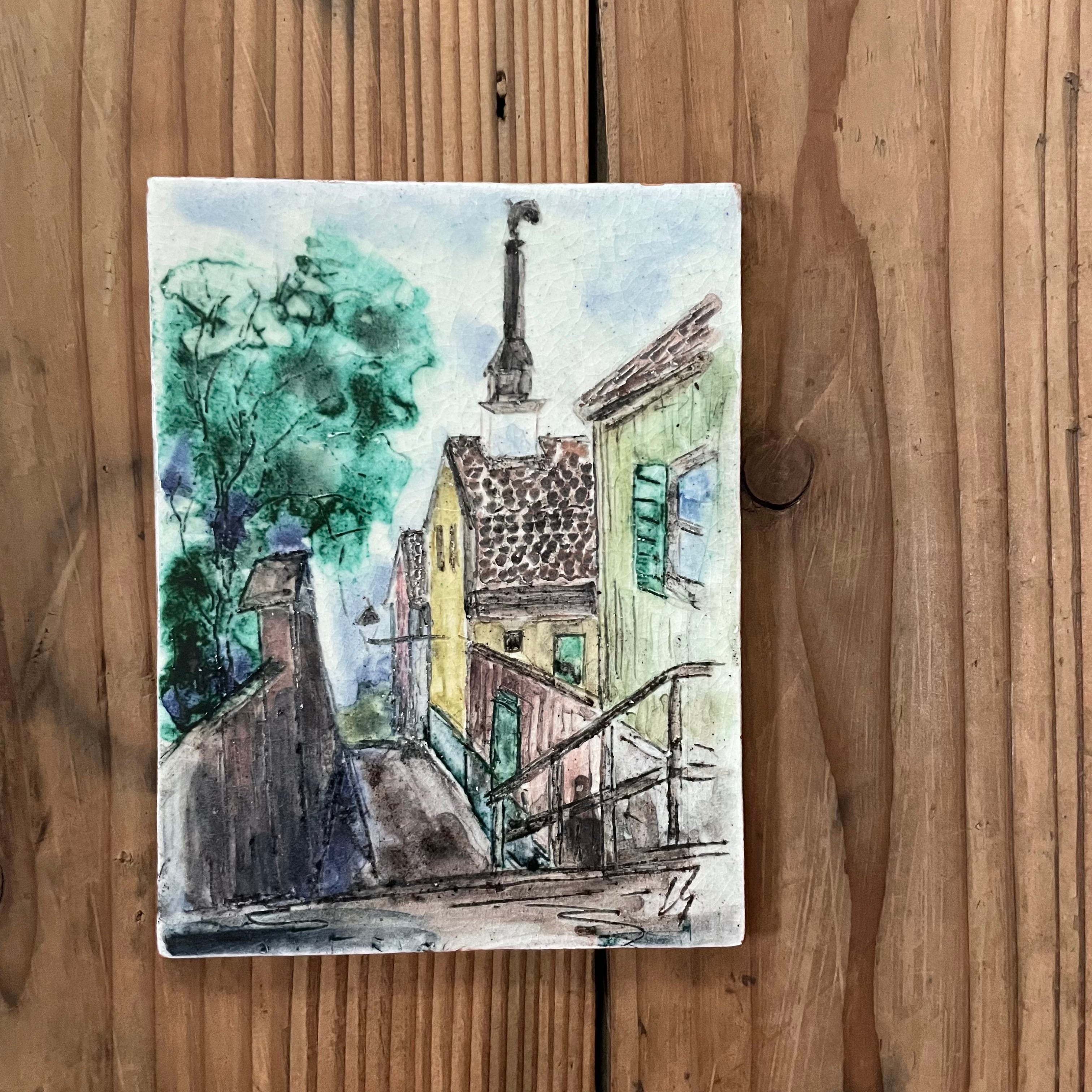 水彩画のような陶器の壁飾り