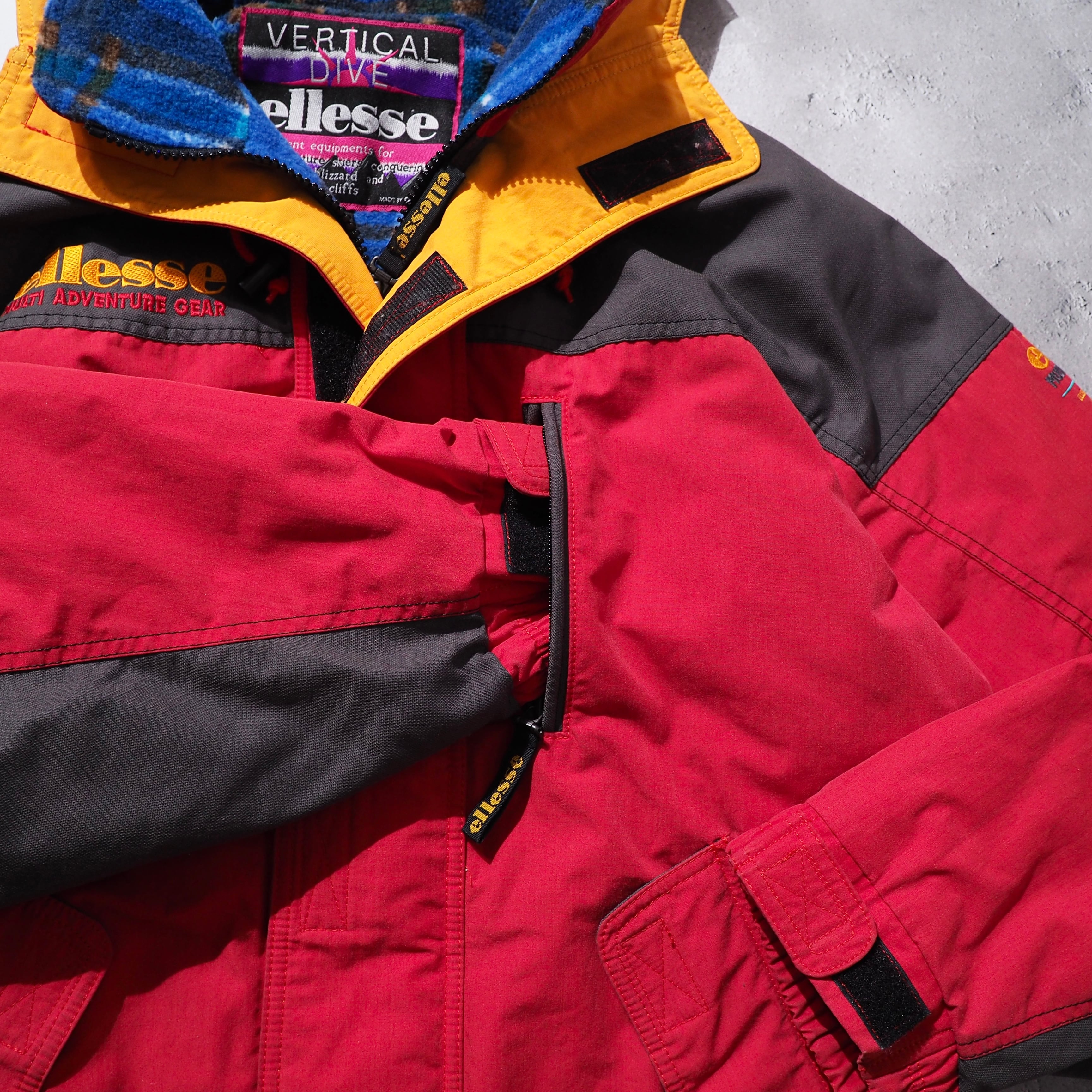 1980 - 90s ” ellesse ” Good multi color full zip vintage nylon jacket Parker