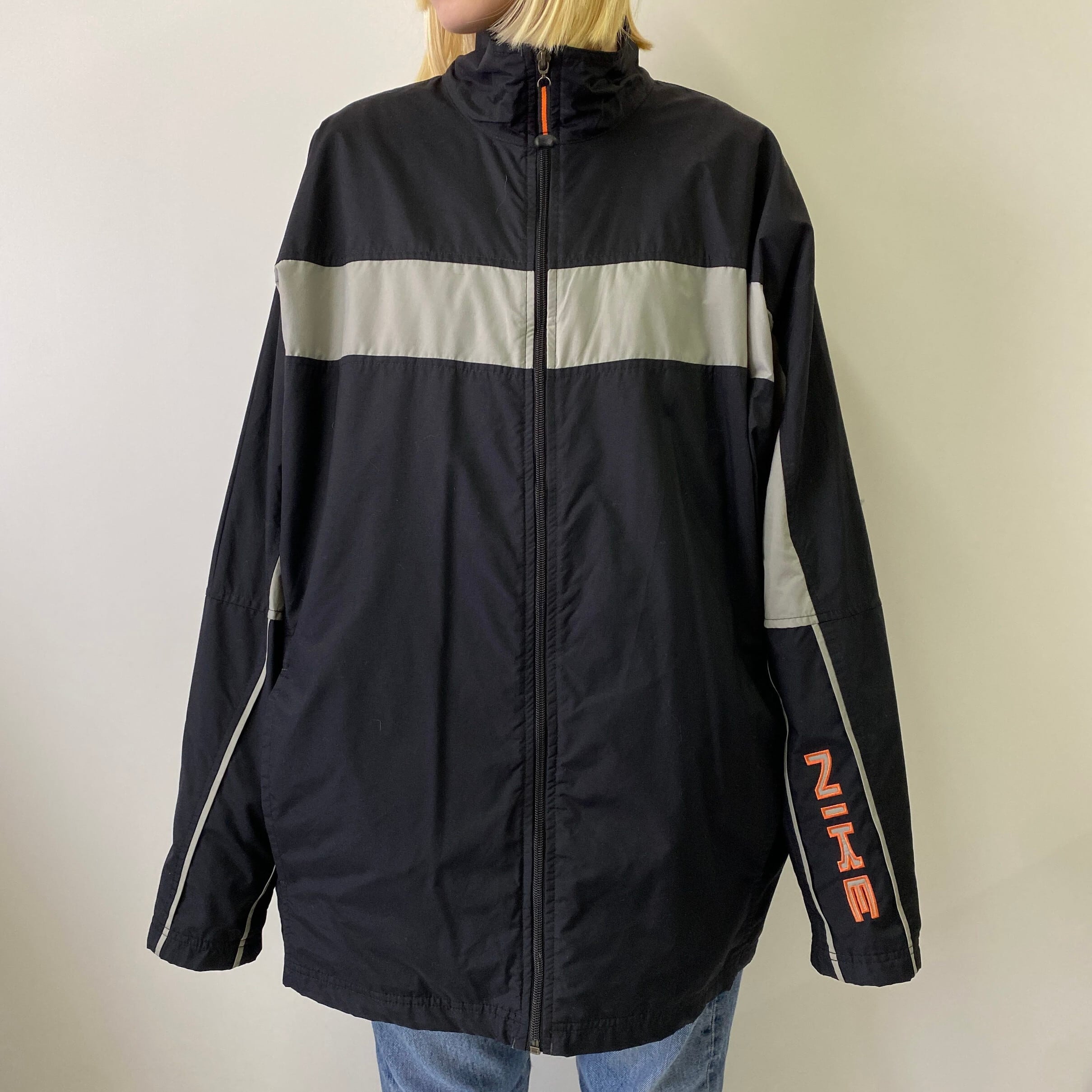 NIKE ナイキ カレッジチーム ロゴ刺繍 ナイロンジャケットメンズL 古着