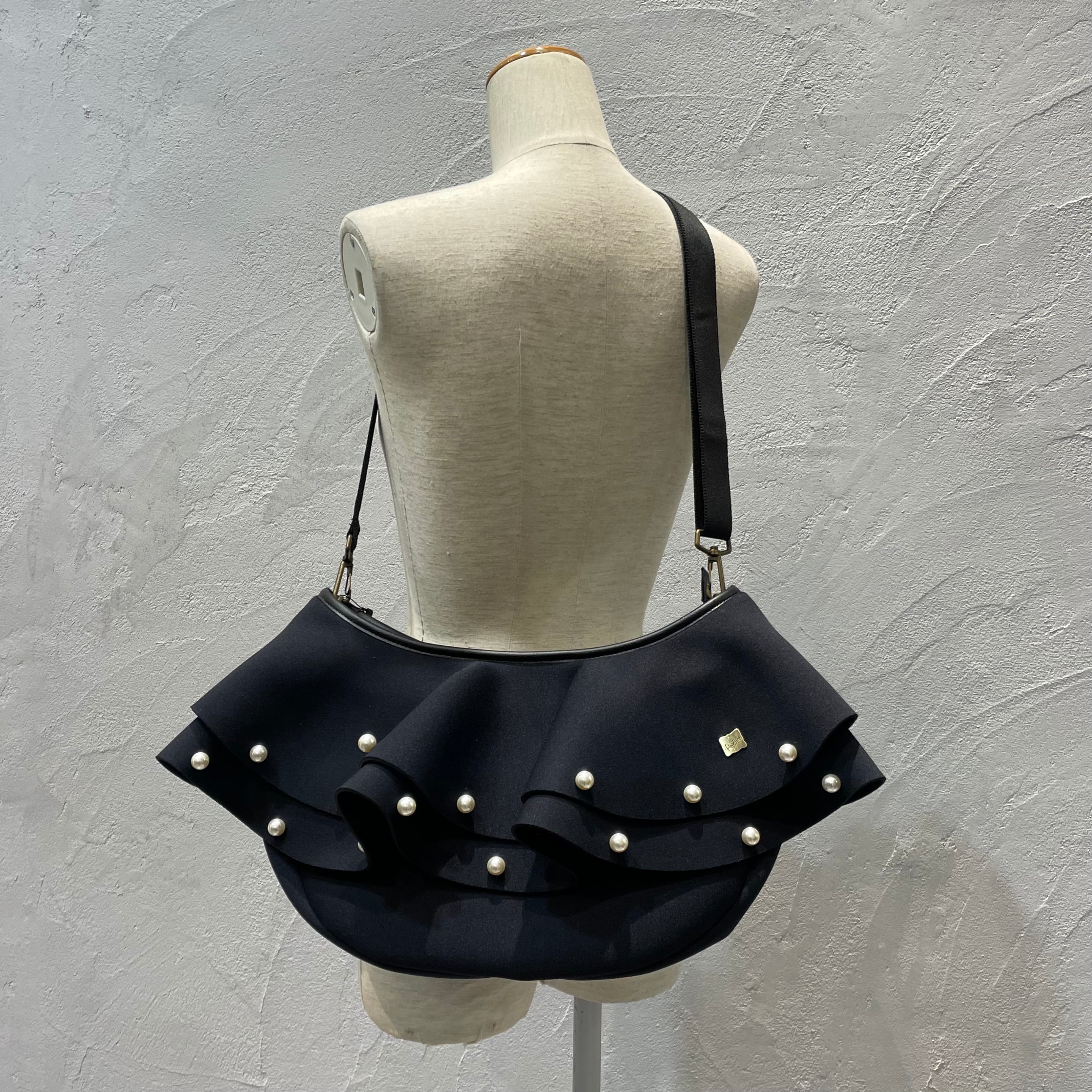 再入荷】Rapture/ティアードネイプルズボディバッグパールエディション  