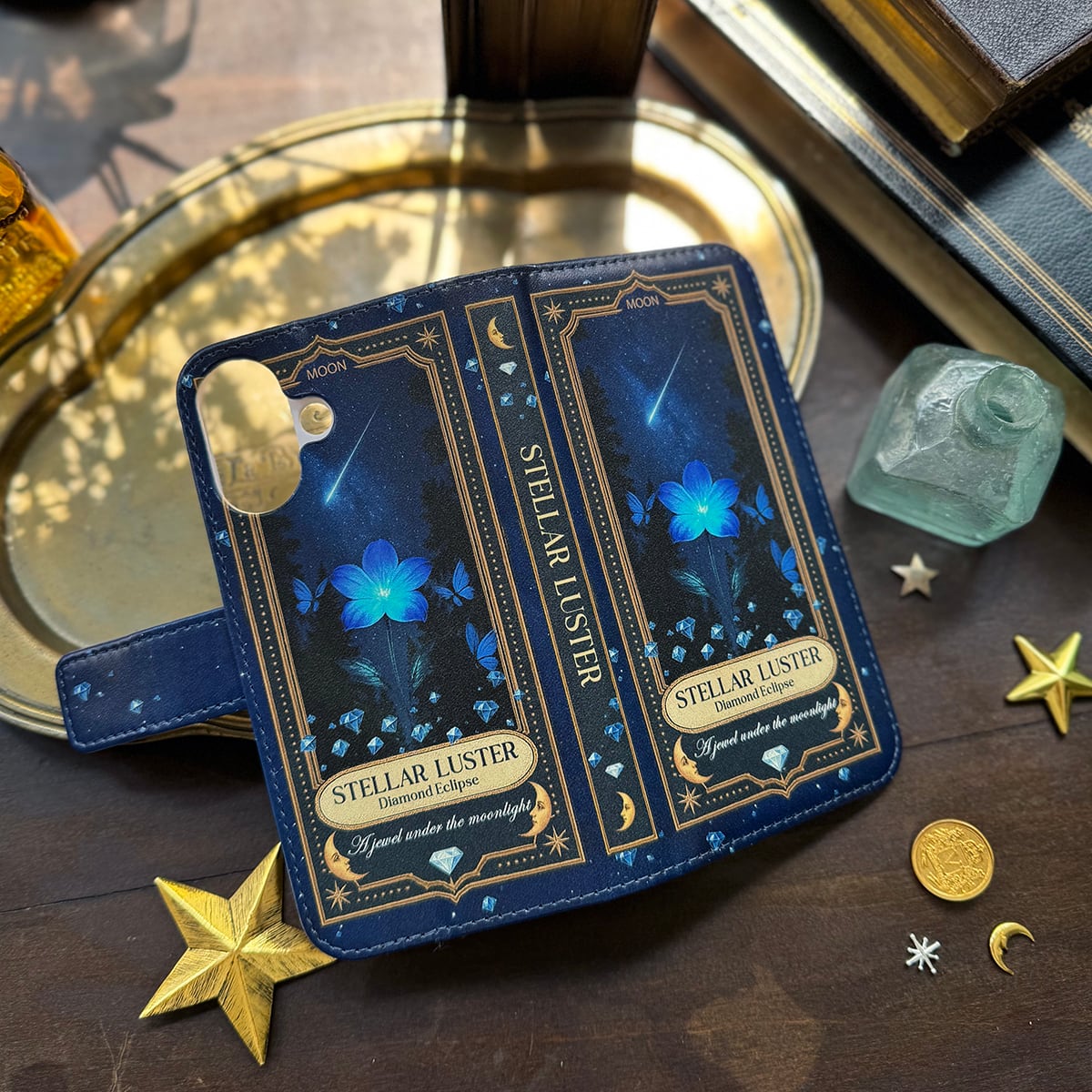 kotaさん専用　可愛い星が降り注ぐ★ウォルト 香水瓶 夜に ダン ラ ニュイ 星空香水瓶 青い花とダイヤと蝶々 ラベル柄 スマホケース 手帳型