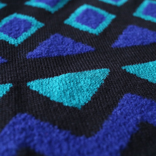 cold color multi motif pattern loose knit