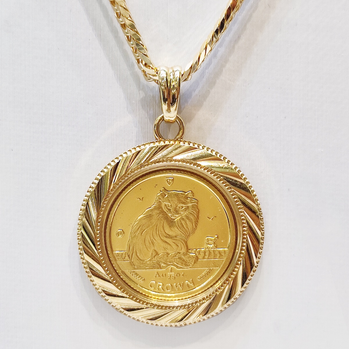 売り切れ】マン島キャットコイン 1/25oz. ペンダントトップ | 広島本通【谷口宝石】