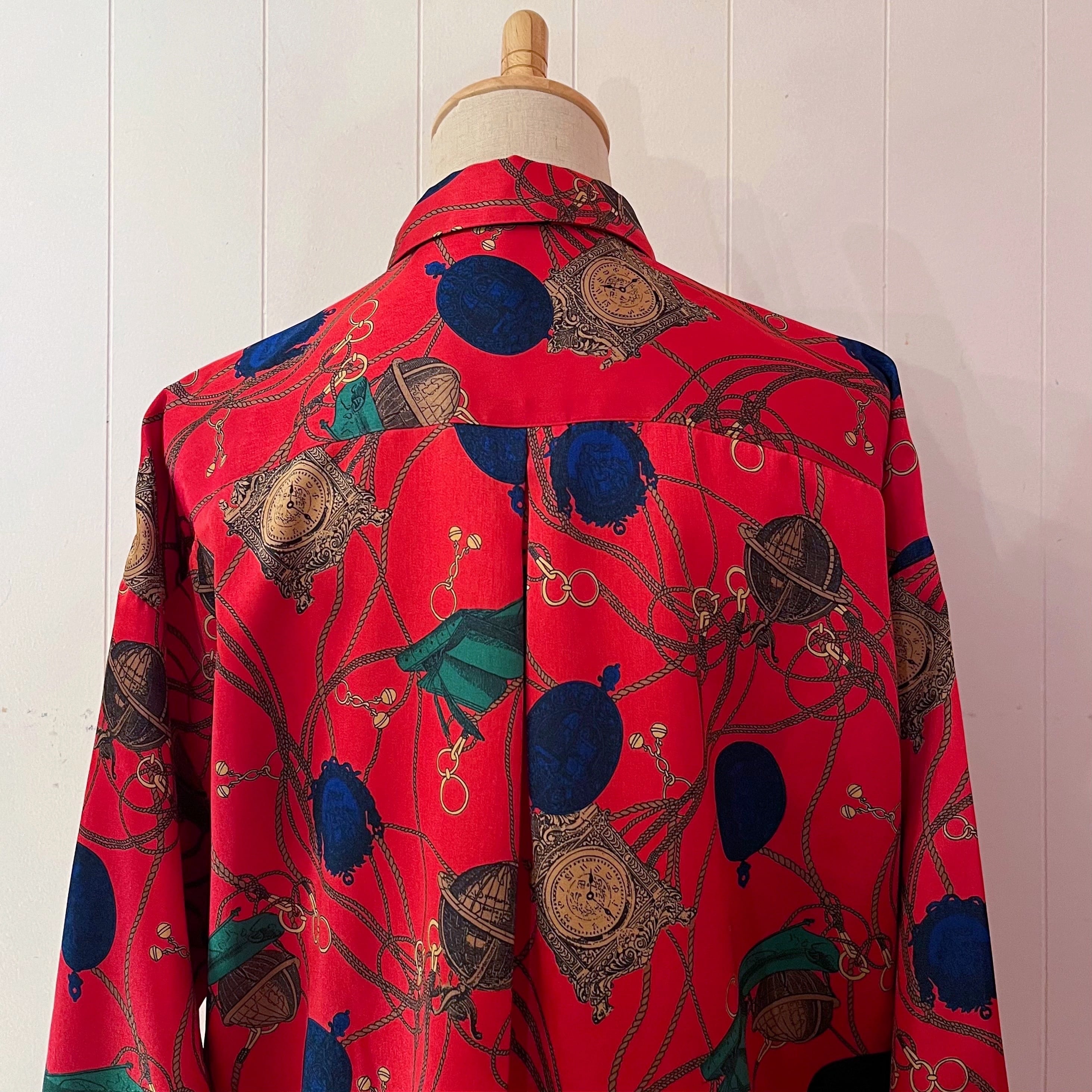 clock and globe red satin blouse
