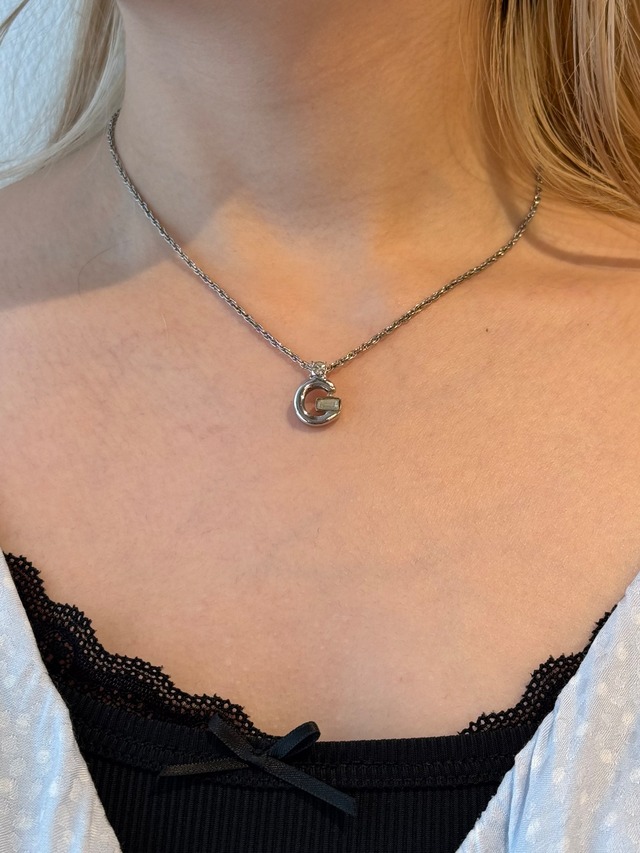 GIVENCHY / vintage silver G logo stone necklace.