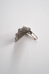 Silver frilled dress clip