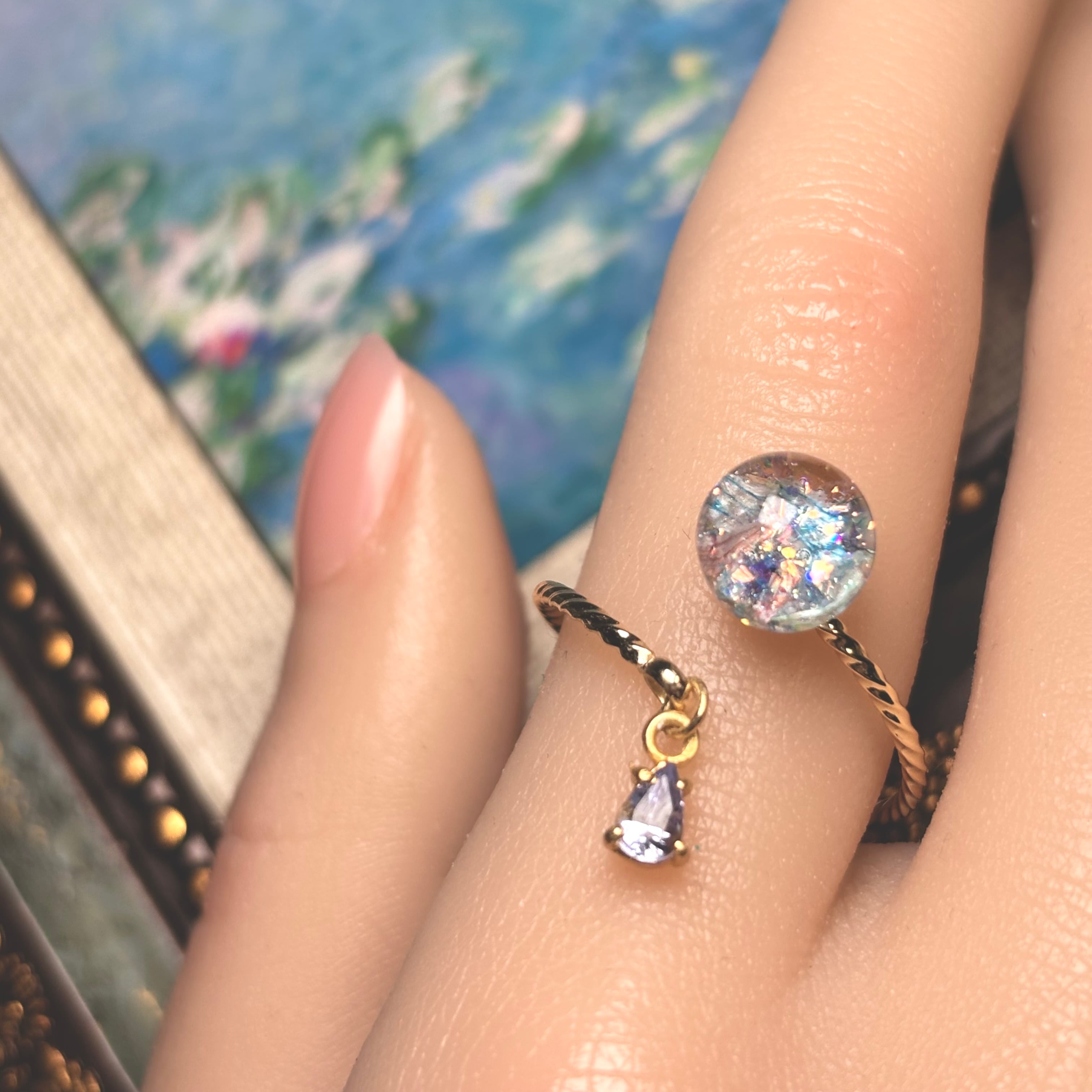 タンザナイト揺れる Lumière ring - mètèore モネ『睡蓮』を纏うリング