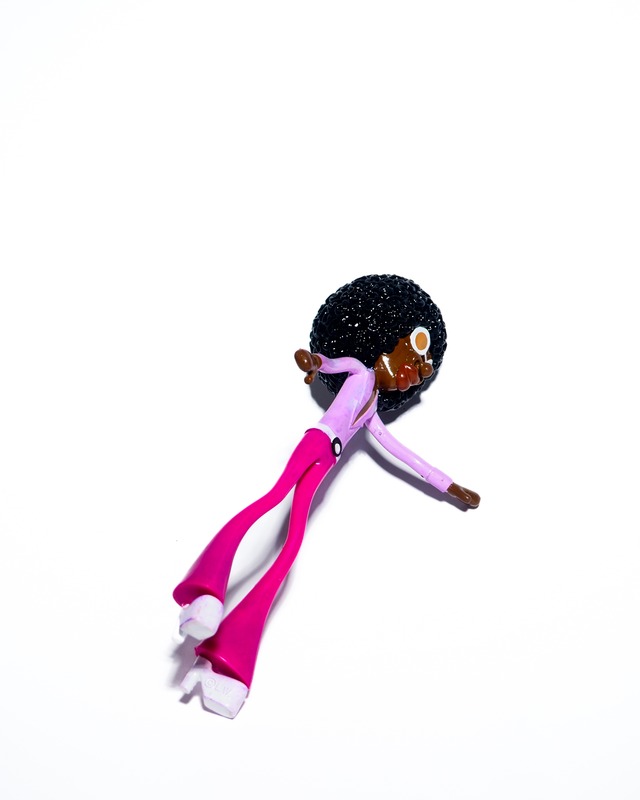 Wiggly Afro-Haired Doll Toy