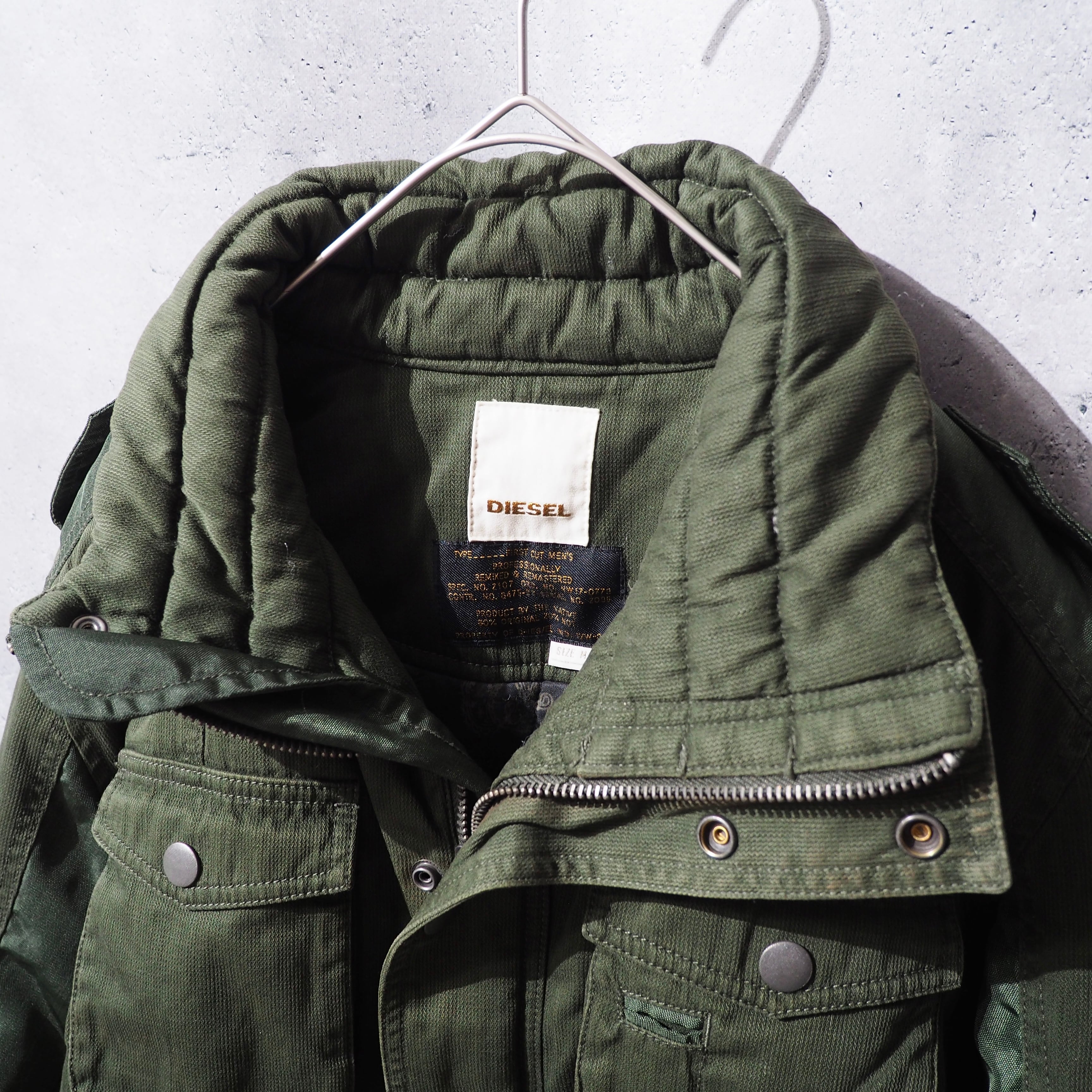 " DIESEL " Big Pockets × Switching nylon High neck Military jacket