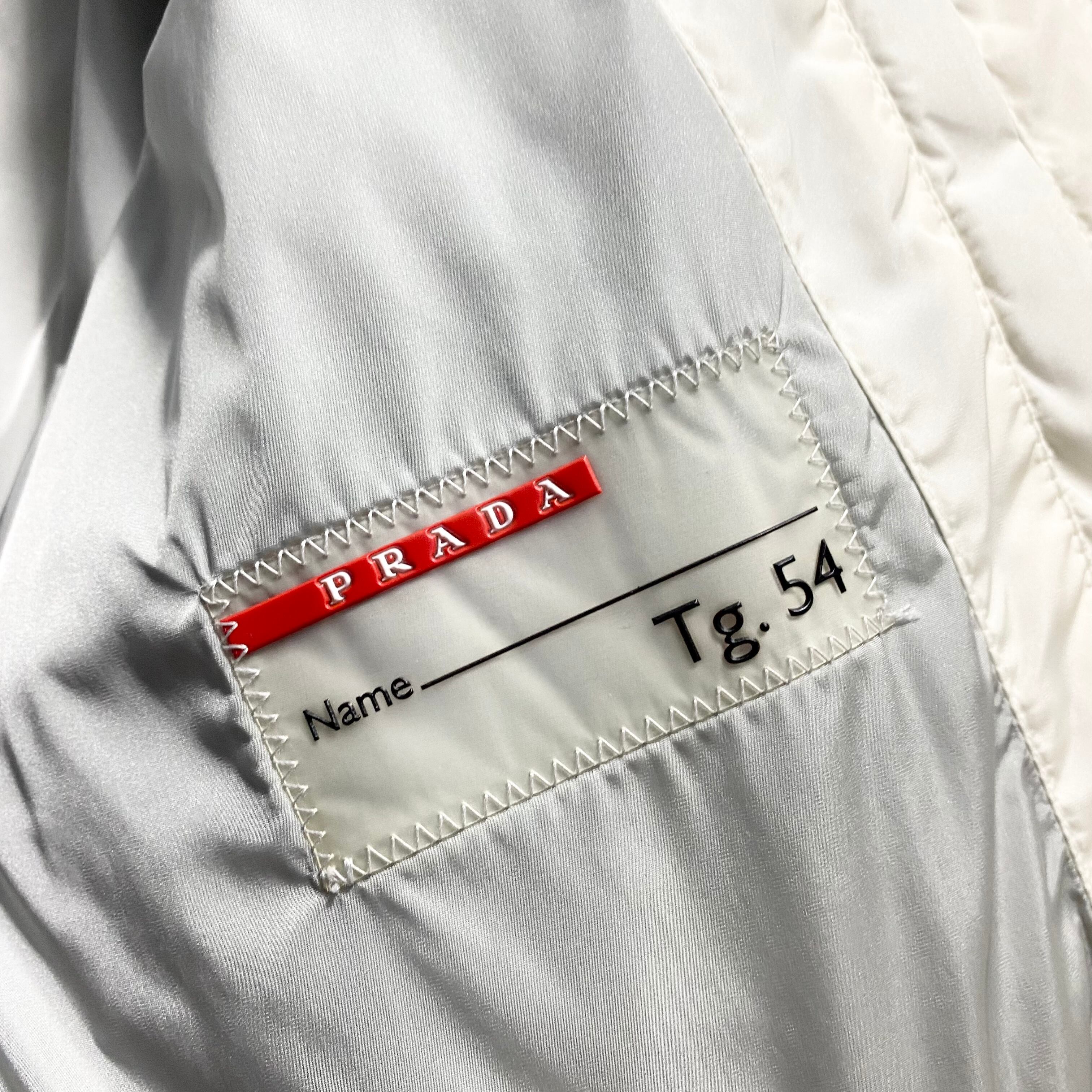 PRADA SPORT white down jacket & hat | NOIR ONLINE