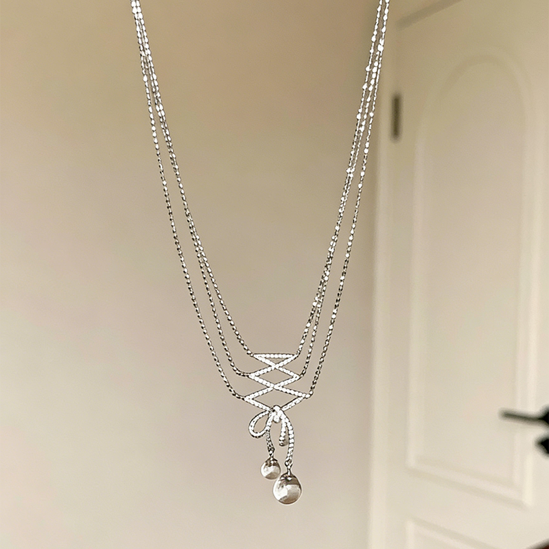 mo透き通るリボンの宝石ネックレス