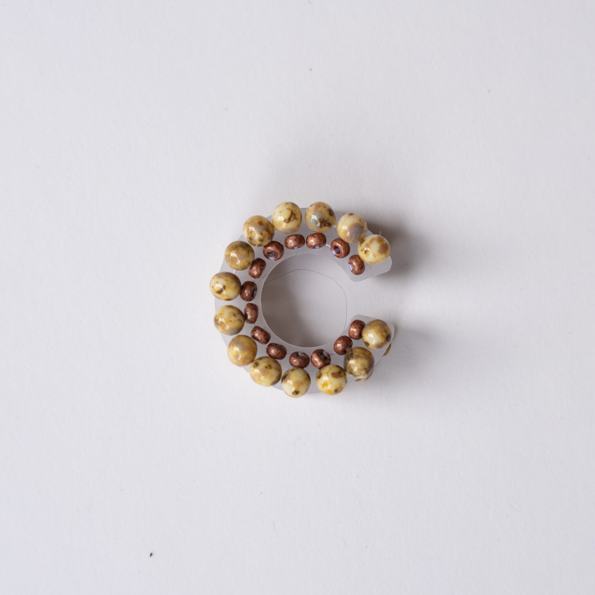 puzzle ring ear cuff [61]