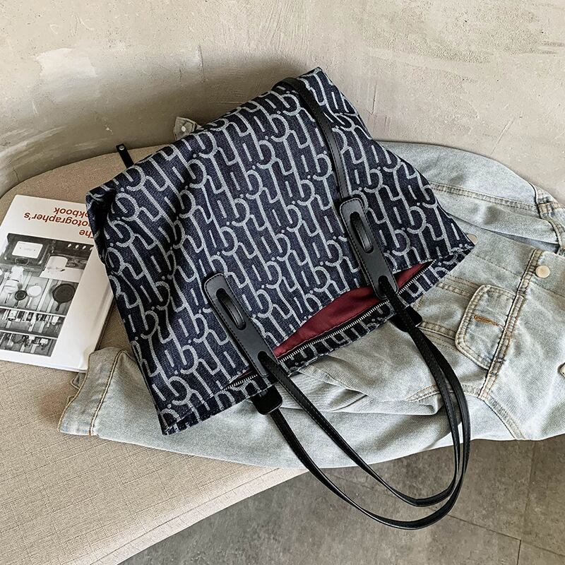 シンプルで大容量のハンドバッグレディースバッグ2020新しい流行のファッションオールマッチウエスタンスタイルのショルダーバッグバージョンのネットレッドトートバッグ 手作りハンドバック30554576484