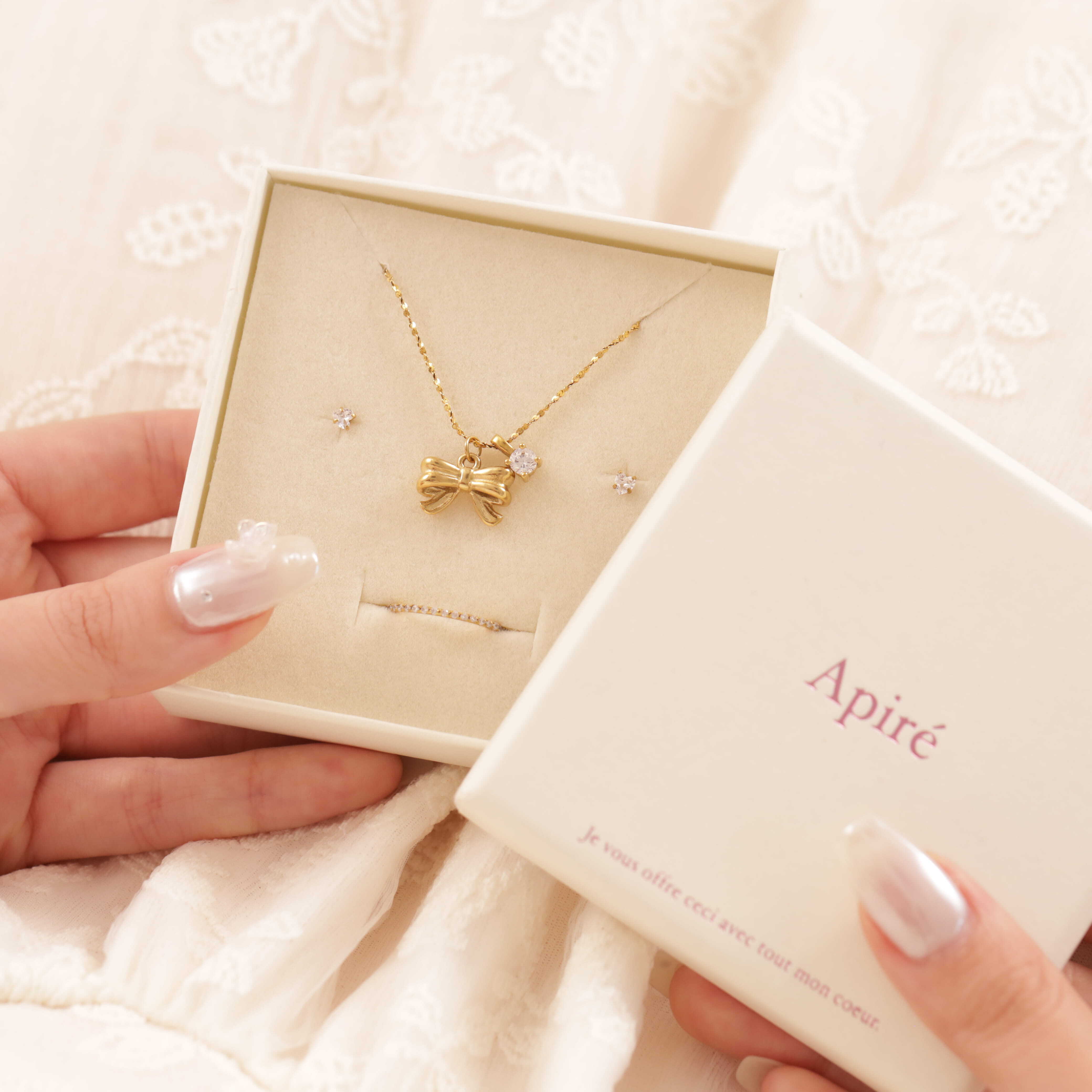 ピアス　No.5063 316L stud ribbon necklace（zirconia ver.) | apire