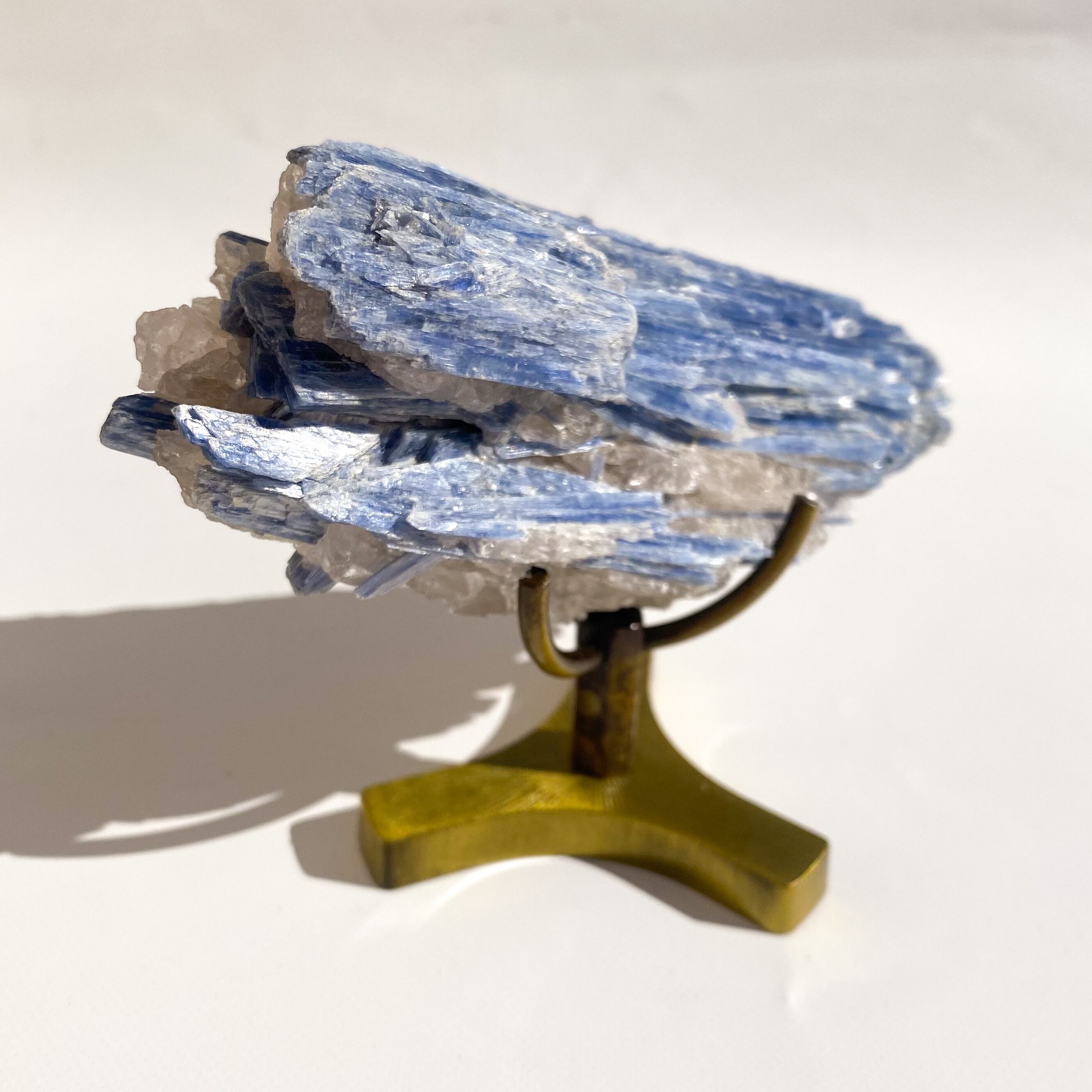 kyanite with gold stand
