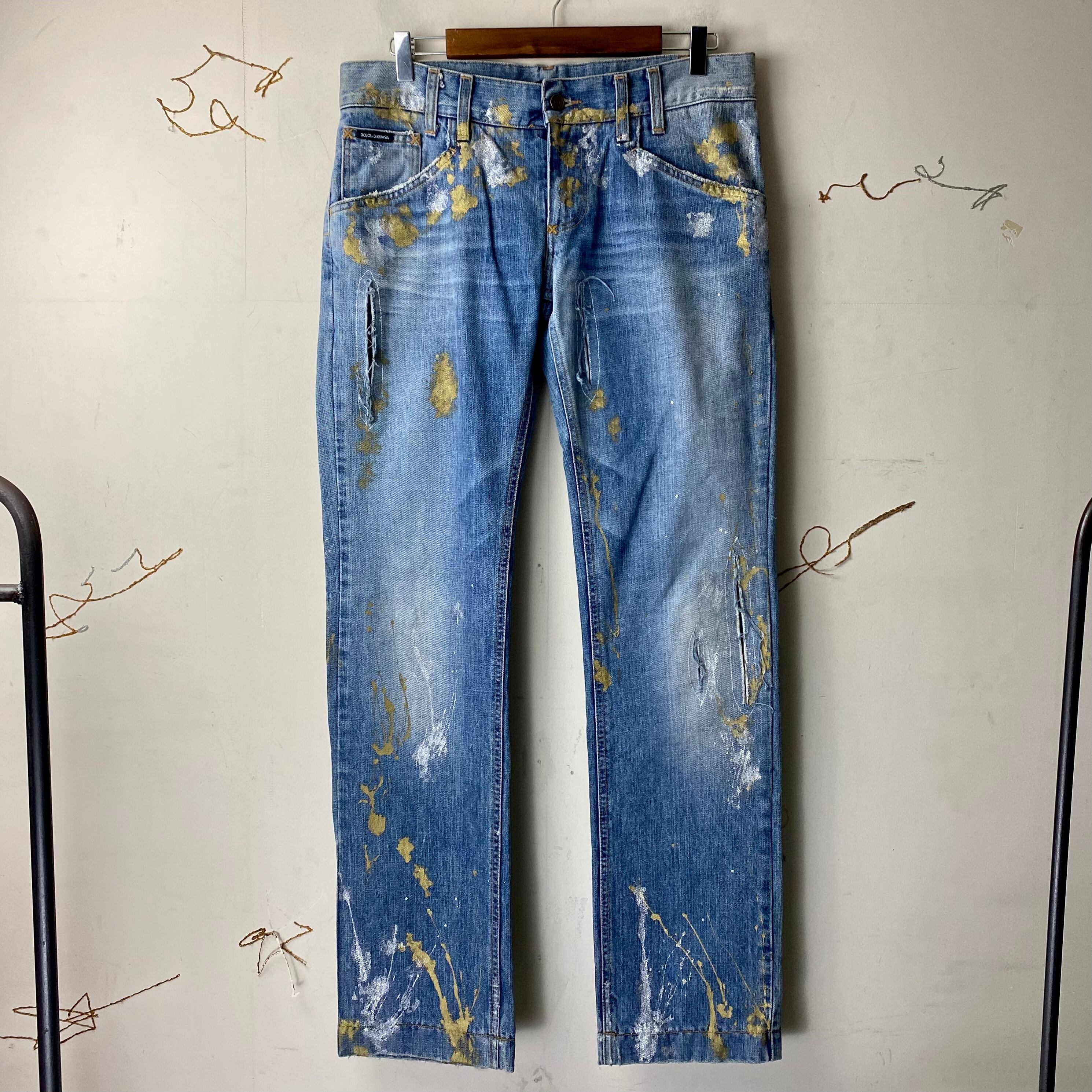 DOLCE&GABBANA gold×silver paint denim pants | NOIR ONLINE