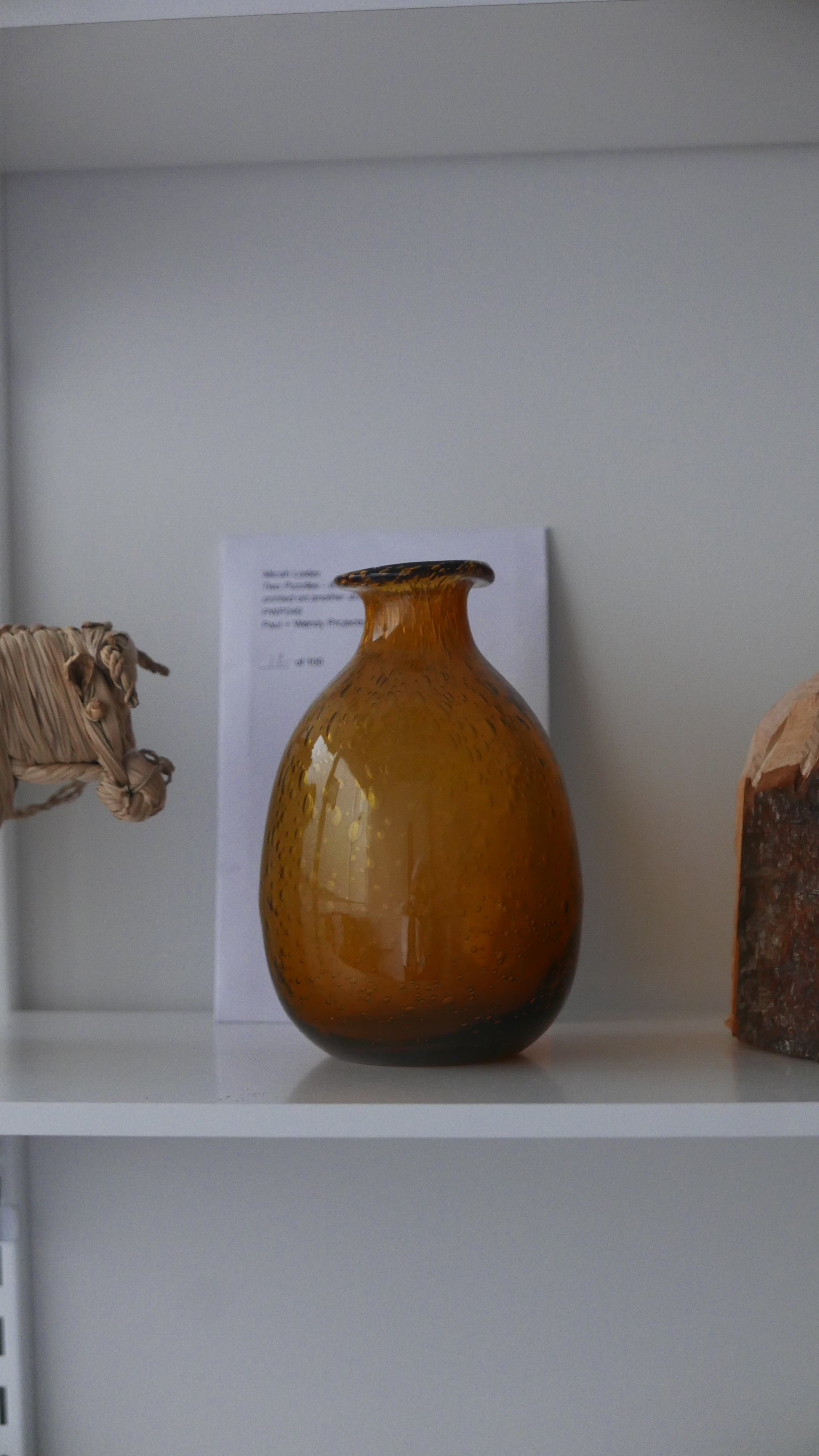 old hand blown bubble glass base , light amber